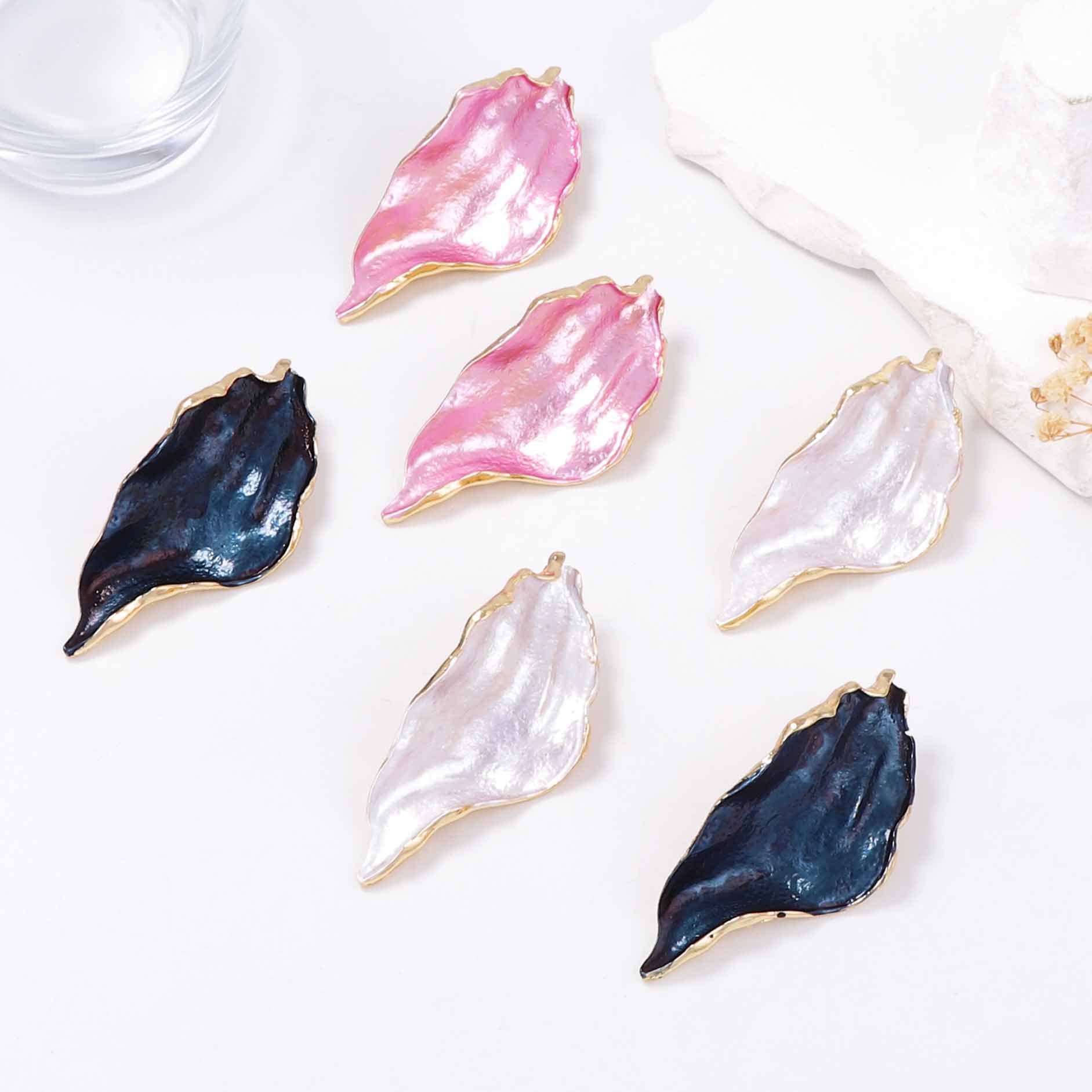 European and American Hot Selling Light Luxury Simple Fashion Irregular Pleated Alloy Drip Oil Leaf Earrings Versatile Women